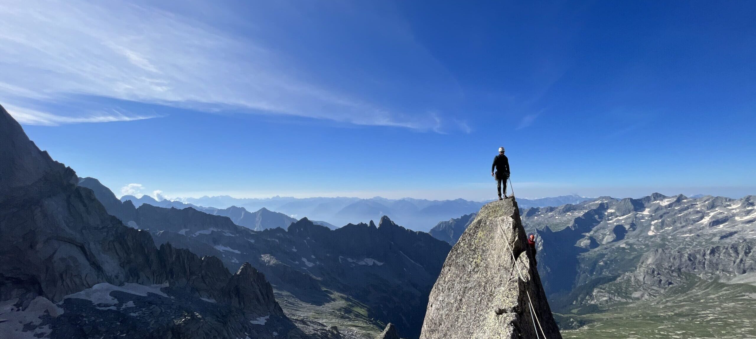 A guide and client planning a custom climbing objective in Catalunya