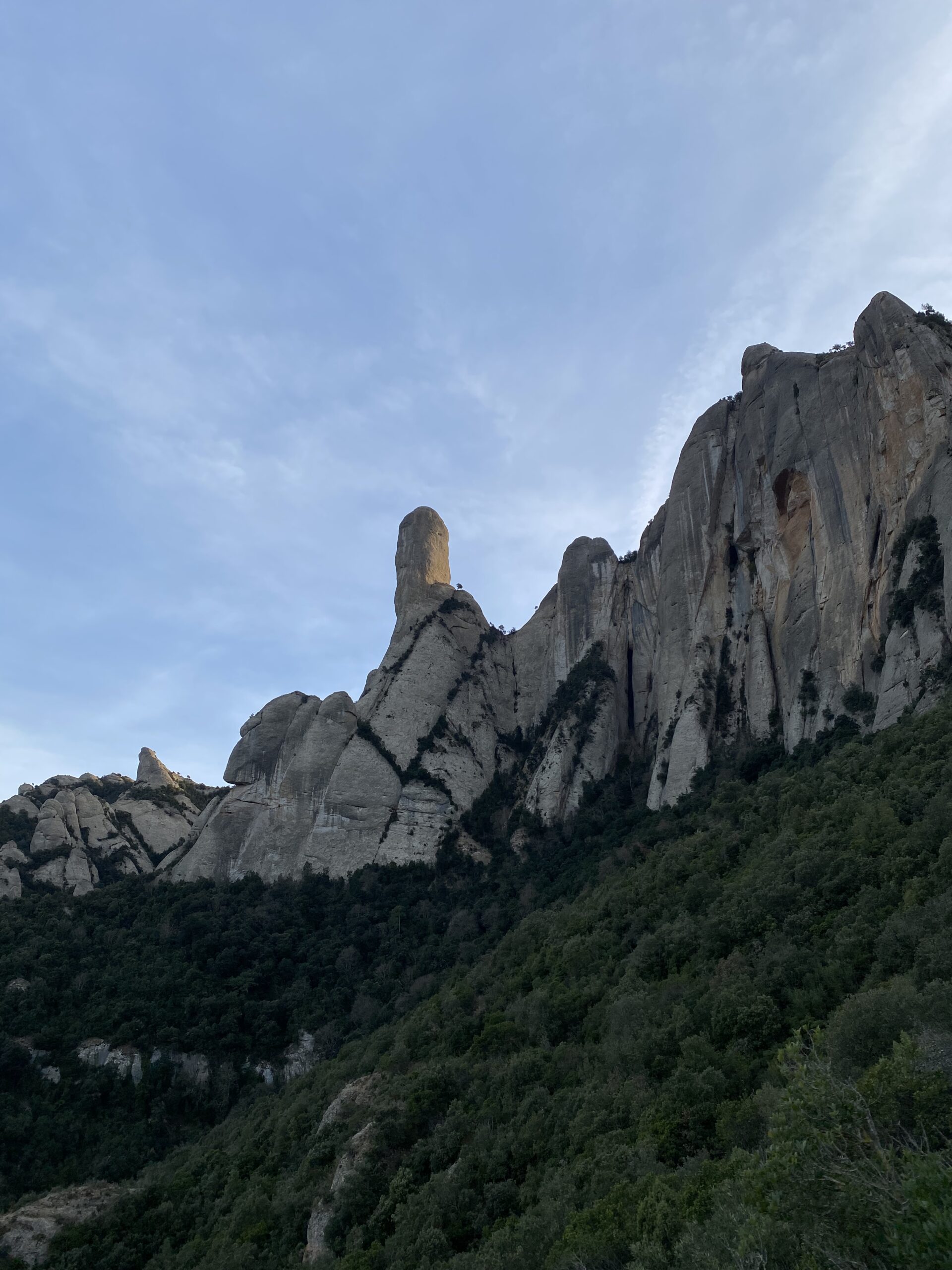 Climbing the north-east arete of the Cavall Bernat, Montserrat