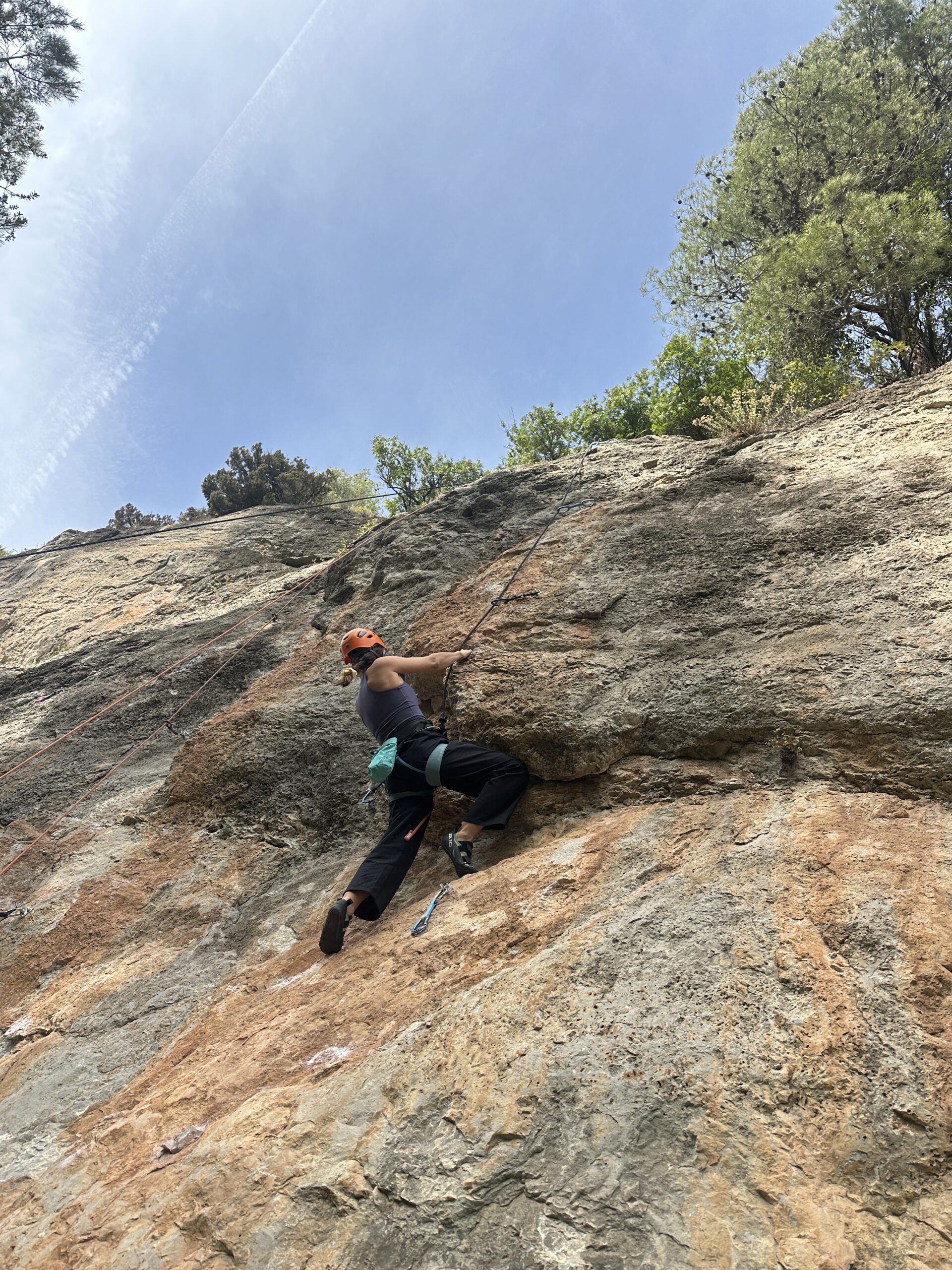 Sport climbing on limestone below the clifftop village of Siurana